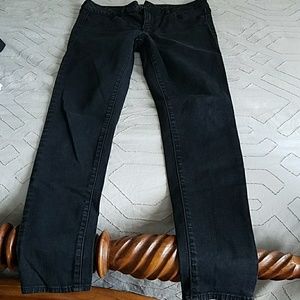Distressed black jeggings